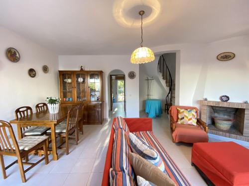 a living room with a couch and a table at Algarve Manta Rota Terrace by Homing in Manta Rota
