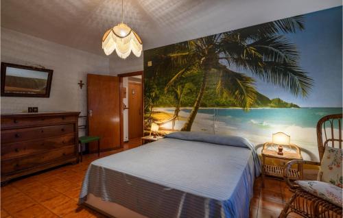 1 dormitorio con 1 cama y una pintura en la pared en Stunning Apartment In Genga With Kitchen, en Genga