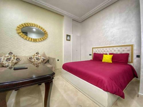 Postel nebo postele na pokoji v ubytování Velasquez Appart Hotel 4