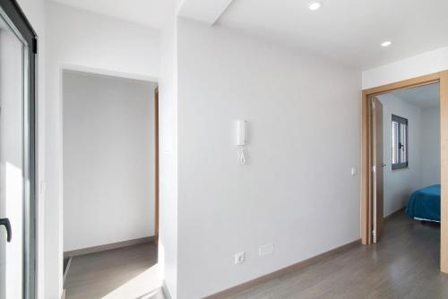 Ένα ή περισσότερα κρεβάτια σε δωμάτιο στο Be Glow Home