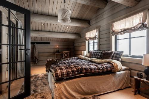 Una cama o camas en una habitación de Villa Hjelmbacken