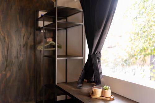 a shelf in a room with a window at Glamping Resort Halicanum in Sveti Martin na Muri