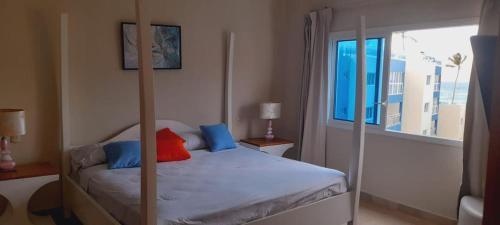 Postel nebo postele na pokoji v ubytování PENTHOUSE OCEAN VIEW