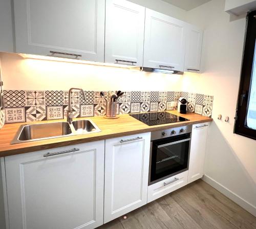 Køkken eller tekøkken på T2 Hyper centre 3 étoiles Rue du Casino