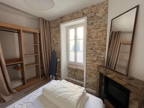 Posteľ alebo postele v izbe v ubytovaní Maison 2 chambres avec cour privée, à 200m de la plage et proche commerces - Les Sables-d'Olonne - FR-1-197-557