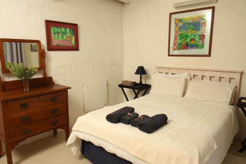 Katil atau katil-katil dalam bilik di Skuurtjies - Beach Front Holiday