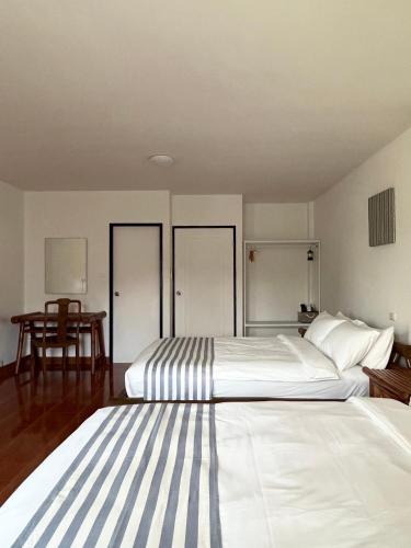 Katil atau katil-katil dalam bilik di Nautical Home & Seashell House B&B
