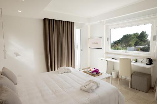 Letto o letti in una camera di San Lorenzo Boutique Hotel & SPA