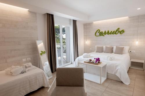 Letto o letti in una camera di San Lorenzo Boutique Hotel & SPA