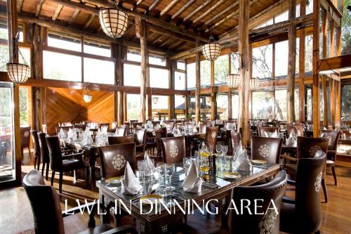 מסעדה או מקום אחר לאכול בו ב-Lobo Wildlife Lodge