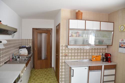 Kuchyň nebo kuchyňský kout v ubytování Haus Grader