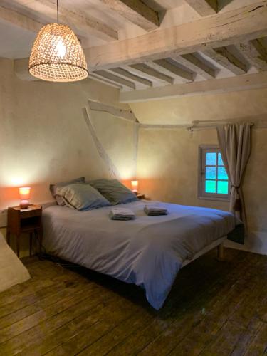 Katil atau katil-katil dalam bilik di Les Maisons de Marie