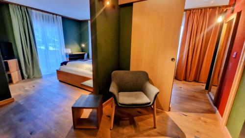 Postel nebo postele na pokoji v ubytování Amber Ski-in/out Hotel & Spa
