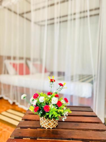 Ένα ή περισσότερα κρεβάτια σε δωμάτιο στο Kawshan Home Stay
