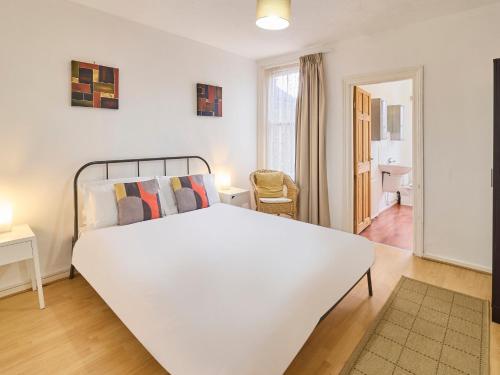 a bedroom with a large white bed in a room at Host & Stay - Saint Peters in Canterbury