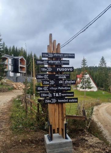 a directional sign in the middle of a road at Ski Chalet Jahorina in Jahorina