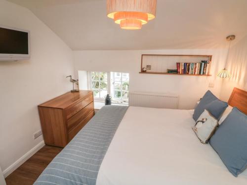 Postel nebo postele na pokoji v ubytování Apple Tree Cottage