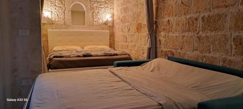 La Casuccia tesisinde bir odada yatak veya yataklar