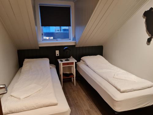 Кровать или кровати в номере Lava Guesthouse