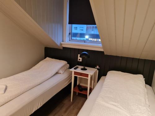 Кровать или кровати в номере Lava Guesthouse