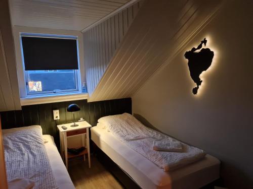 Кровать или кровати в номере Lava Guesthouse