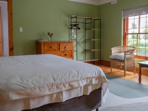 En eller flere senge i et værelse på Heritage Villa Tamboerskloof