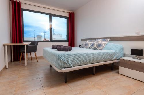 Posteľ alebo postele v izbe v ubytovaní Casa Dana El Cotillo with private terrace