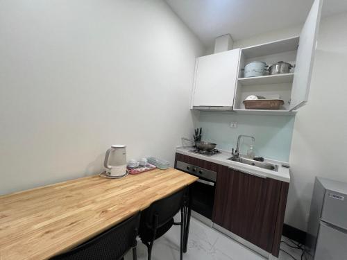 Η κουζίνα ή μικρή κουζίνα στο Budget Private Studio with Free Luxurious Pool and Gym by SYM B625