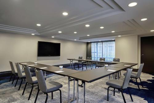 a conference room with a large table and chairs at Hotel 1000, LXR Hotels & Resorts in Seattle