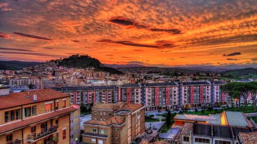 a view of a city at sunset at B&B Ciocca I in Campobasso