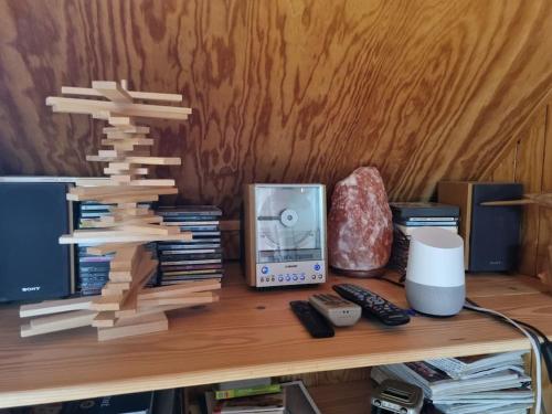 a desk with a wooden tower on top of it at Chalet climatisé grande terrasse parking privé in Coublevie
