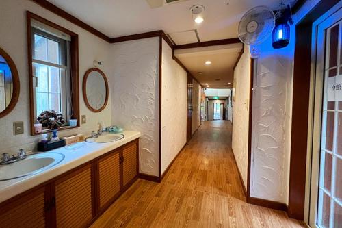 a bathroom with two sinks and a walk in shower at Windy Hill Morinoyado - Vacation STAY 07709v in Yamanakako