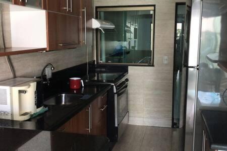 Dapur atau dapur kecil di NX Pousadas
