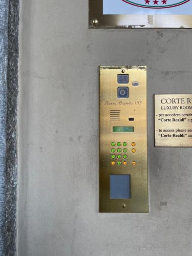 an elevator with a control panel on a wall at Casa Florian in Turin