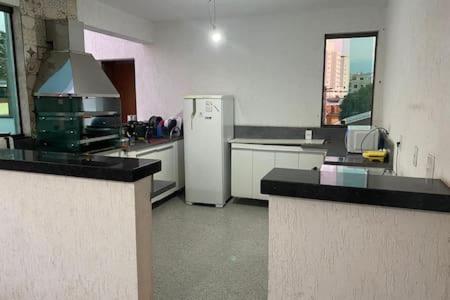 Dapur atau dapur kecil di NX Pousadas