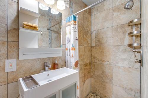 a bathroom with a sink and a shower at Charming Idaho Springs Retreat on Chicago Creek! in Idaho Springs