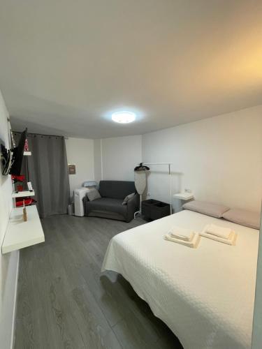 Postel nebo postele na pokoji v ubytování Loft Calypso