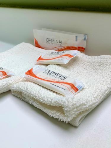two folded towels sitting on top of a table at Executive Inn Chester in Chester