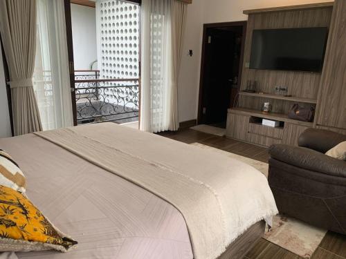 Un ou plusieurs lits dans un hébergement de l'établissement MODERN HOUSE IN CANGGU