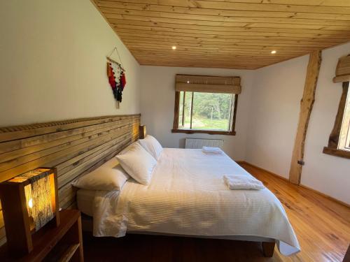 Postel nebo postele na pokoji v ubytování Pu Am Eco Lodge