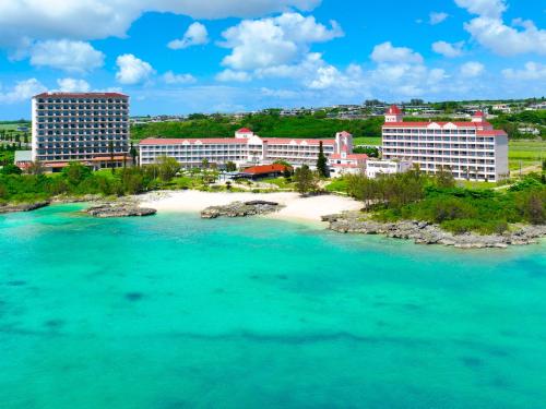 an aerial view of the resort and the beach at Hotel Breezebay Marina in Miyako Island