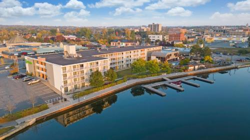an aerial view of a city next to a river at Holiday Inn Hotel Peterborough Waterfront by IHG in Peterborough