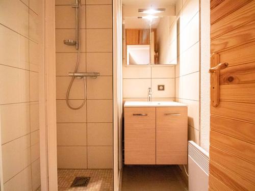 a small bathroom with a shower and a sink at Appartement Valmorel, 3 pièces, 6 personnes - FR-1-356-395 in Valmorel