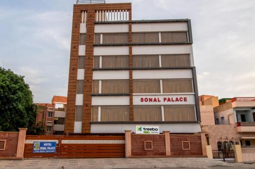 a building with a sony palace sign on it at Treebo Trend Sonal Palace 1 Km From Jodhpur Airport in Jodhpur