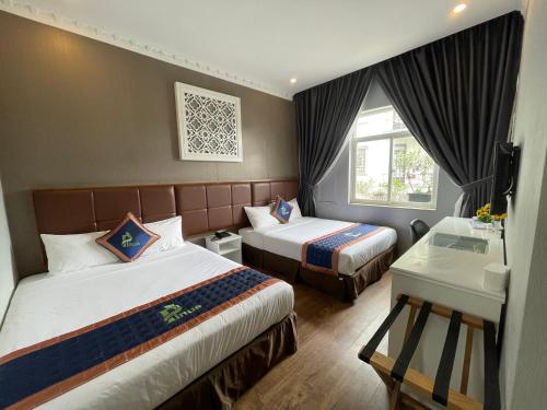 Postel nebo postele na pokoji v ubytování Pinus Hotel