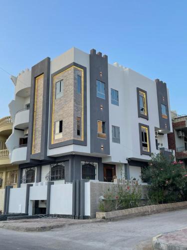 a large building with at Villamar Sea View rooms & apartments in Hurghada