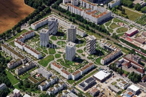 an overhead view of a city with tall buildings at Holiday Home Munich in Munich