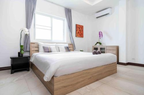 Postel nebo postele na pokoji v ubytování 1 bedroom apartment in Nai Harn