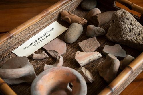 a basket of rocks and other items on a table at The Resort at Isla Palenque Member of the Cayuga Collection in Boca Chica