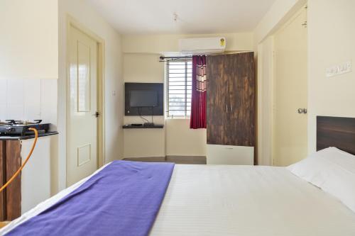 Ένα ή περισσότερα κρεβάτια σε δωμάτιο στο Stayhome Classic